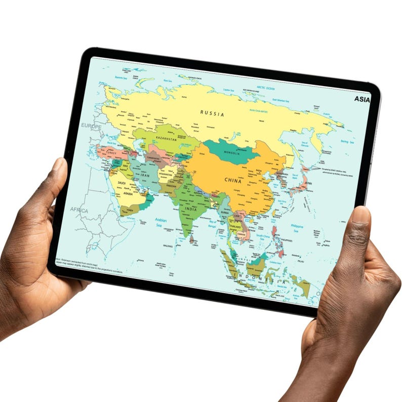 May include: A tablet displaying a colorful map of Asia, held by two hands. The map highlights countries with various colors, including yellow, green, and orange. The word "ASIA" is visible in the upper right corner of the tablet.