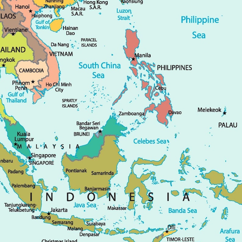 May include: A detailed map of Southeast Asia and surrounding areas, including the Philippines, Indonesia, and Malaysia. The map highlights countries, major cities, and bodies of water such as the South China Sea and Java Sea. The map is in shades of green, brown, and blue.