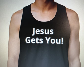 May include: Black tank top with the white text "Jesus Gets You!". The sleeveless shirt has a rounded neckline and is made of a dark fabric. The text is centered on the chest.