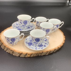 Set of 6 blue and white floral demitasse cups and saucers. 19f