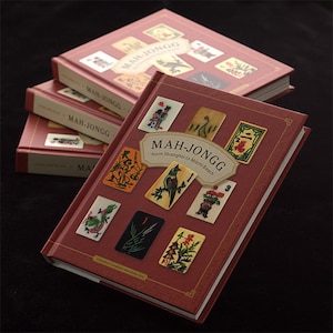Uncover the beauty and history of Mah Jong & learn to play the game with the visually packed book "Mah-Jongg: From Shanghai to Miami Beach"