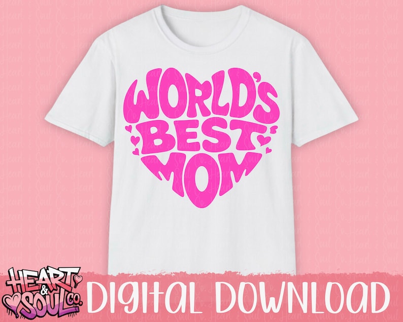K&ouml;nnte beinhalten: Wei&szlig;es T-Shirt mit einem pinkfarbenen Herzdesign, auf dem in einer Retro-Schriftart "World's Best Mom" steht.