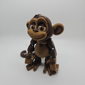 3D Printed Articulated Monkey – Hangs by Hands or Tail – Designed by FrexiFactory