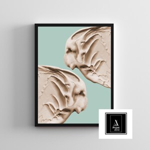 May include: Abstract art print featuring two textured, beige brushstrokes against a light teal background, framed in black. The artwork evokes a sense of movement and depth, suitable for modern home decor.