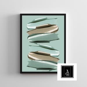 May include: Framed art print featuring a series of textured brushstrokes in shades of teal and gold against a light teal background. The artwork is encased in a black frame. The lower right corner has a white square with the text "Art Prynt able".