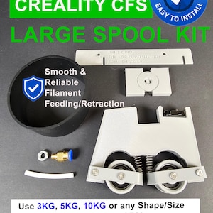 May include: A Creality CFS large spool kit containing a black cylindrical spool holder, a gray 3D-printed bracket with two wheels and springs, a drill guide, a metal nut, a brass pneumatic fitting, and a short white tube for 3D printer filament.
