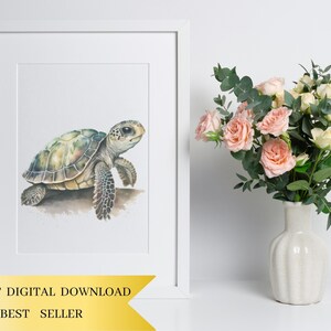 May include: A watercolor painting of a sea turtle on a white background. The turtle is green, brown, and yellow with a light brown shell. The turtle is facing the right side of the image. The painting is framed in a white frame.