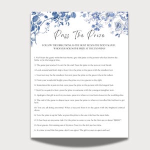 May include: A blue and white floral design printable game card with the title "Pass The Prize" and instructions for a bridal shower game. The instructions are written in a rhyming format.