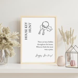 May include: A printable sign with a black and white illustration of a house key and the text "HOUSE KEY HUNT". The text below the illustration reads "There are keys hidden throughout the house. Whoever finds the most wins a prize. Happy Hunting!"