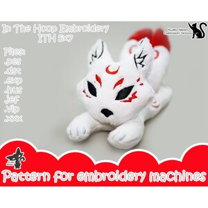 May include: White plush fox with red and black embroidery, lying down with its tail curled up. The embroidery design includes a crescent moon and flames. The text "In The Hoop Embroidery ITH 5x7" and "Files: .pes .dst .exp hus jef .vip xxx" is visible on the image. The text "Pattern for embroidery machines" is visible at the bottom of the image.
