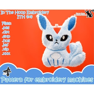 May include: A blue and white plush toy in the shape of a fox with a red triangle on its forehead. The toy is hanging from a white string. The text "In The Hoop Embroidery ITH 4x4" is at the top of the image. The text "Files: .pes .dst .exp .hus .jef .vip .xxx" is on the left side of the image. The text "KURO NEKO EMBROIDERY DESIGNS" is on the right side of the image. The text "Pattern for embroidery machines" is at the bottom of the image.