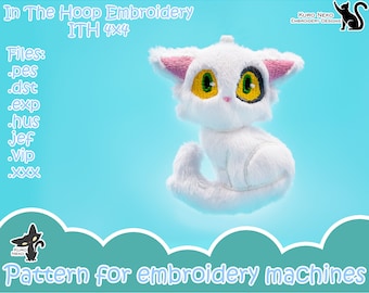 May include: White plush cat with black and yellow eyes, sitting in a 4x4 inch embroidery hoop. The image includes the text "In The Hoop Embroidery ITH 4x4" and "Files: .pes .dst .exp .hus .jef .vip .xxx".