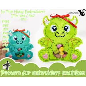 May include: Green dragon-shaped felt candy holder with a small opening for treats. The holder is designed for embroidery machines and comes in three sizes: 4x4, 5x7, and 7x7 inches. The files included are .pes, .dst, .exp, .hus, .jef, .vip, and .xxx.