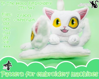 May include: White plush cat with yellow eyes and a pink nose, sitting on a white pillow. The cat is embroidered with a black nose and mouth. The image includes the text "In The Hoop Embroidery ITH 5x7 Files: 2 faces .pes + keychain .dst .exp .hus jef .vip .xxx Pattern for embroidery machines".