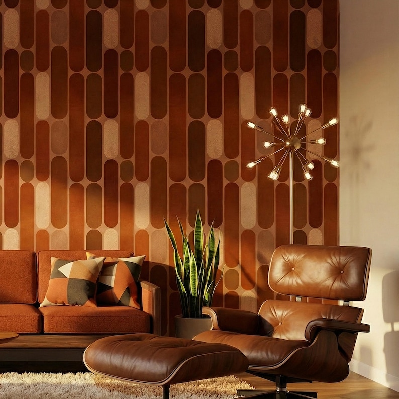 a modern living room with a brown leather chair, a brown sofa, and a potted plant. The room has a geometric patterned wallpaper and a large circular light fixture.