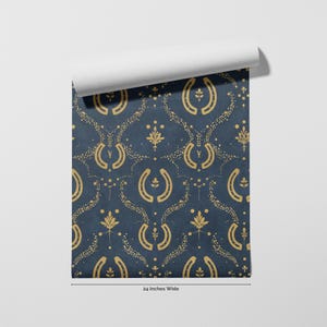 a repeating pattern of gold and blue designs on a dark background.