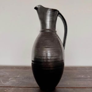 Signed Studio Pottery Pitcher with Black Glaze with Blue Interior