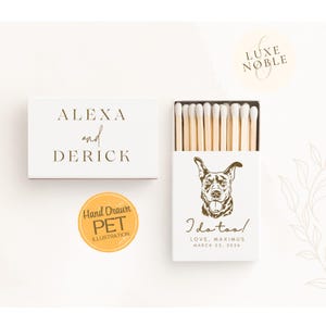 May include: White matchbox with the names "ALEXA and DERICK" printed in gold. The open matchbox features a dog illustration and the text "I do too! LOVE, MAXIMUS MARCH 22, 2026". A round sticker reads "Hand Drawn PET ILLUSTRATION".