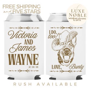 May include: White can coolers with brown text and designs. One cooler reads "Victoria AND James WAYNE 12/20/26". The other cooler has a dog wearing a cowboy hat and the text "I DO, too! LOVE, Bunty".