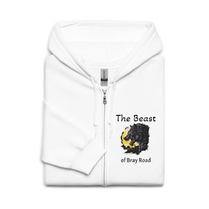 May include: White zippered hoodie with a black wolf howling at the moon graphic. The text "The Beast of Bray Road" is printed below the graphic.