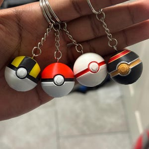 May include: A set of three ceramic canisters with lids, featuring a geometric pattern in shades of blue, white, and gray. The canisters vary in size, suitable for kitchen storage.