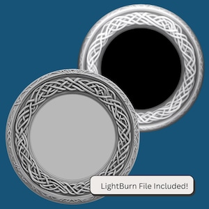 May include: A silver-colored, circular, decorative frame with a Celtic knot design. The frame is shown with a black background and a gray background. LightBurn File Included! is written in white text on a black background.