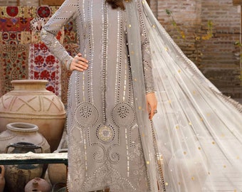 Embroidered net top dresses pakistani
