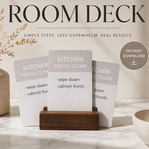 May include: ADHD Cleaning Room Deck cards with simple steps for less overwhelm. The cards are displayed in a wooden holder. The cards say "Kitchen Focus Clean" with bullet points for cleaning tasks. The image also includes the text "Instant Download".