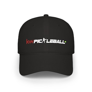 May include: Black baseball cap featuring the text "kw PICKLEBALL" in white and red, with a pickleball player silhouette and a green pickleball. A stylish accessory for pickleball players.