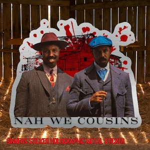 May include: Holographic metal sticker featuring two men in vintage attire, with a red barn graphic and blood splatter. The text "NAH WE COUSINS" is displayed, along with "SINNERS STICKER HOLOGRAPHIC METAL STICKER".