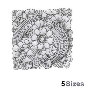 May include: Black and white embroidery design featuring a floral pattern with intricate details. The design includes a large flower with a circle in the centre, surrounded by smaller flowers and swirls.