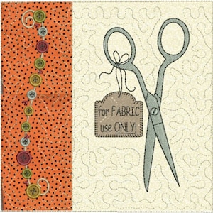 May include: A pair of silver fabric scissors with a brown tag that reads "for FABRIC use ONLY!" on a cream background with a stitched pattern.