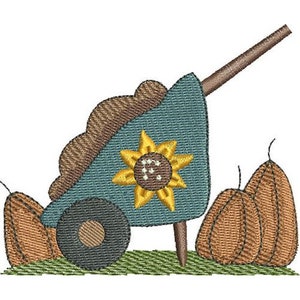 May include: A blue wheelbarrow with a brown handle and a yellow sunflower design. The wheelbarrow is filled with brown dirt and there are three brown pumpkins in front of it.