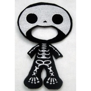 May include: A black and white embroidered skeleton patch. The patch features a round head with large black eyes and a wide open mouth. The body is black with white rib cage and bone details. The patch is a fun, spooky accessory.