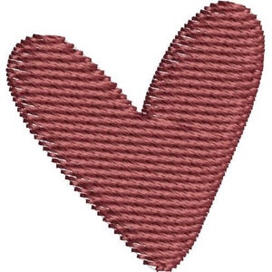 May include: A red heart-shaped design with a textured pattern.