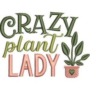 May include: Embroidered design with the text "Crazy Plant Lady" in green and pink lettering. A small potted plant with green leaves is to the right of the text.