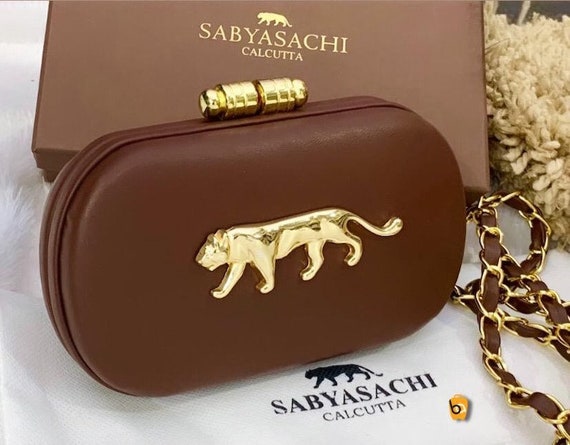 Price of sabyasachi clutch new arrivals