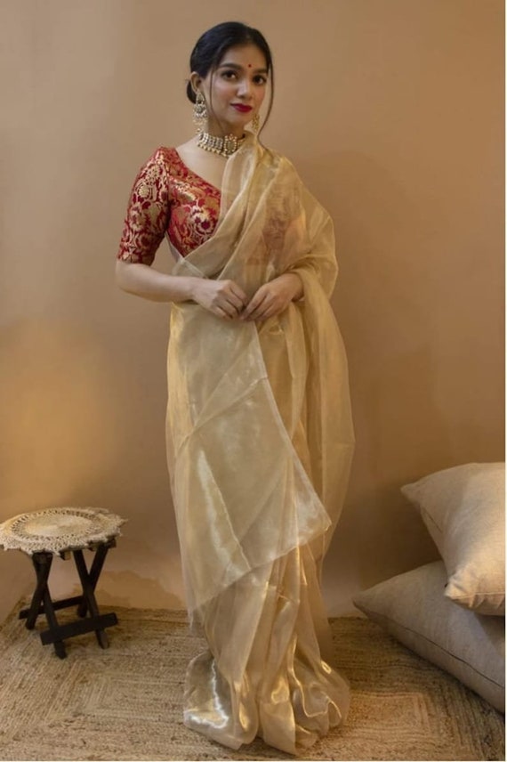 golden silk saree with red blouse