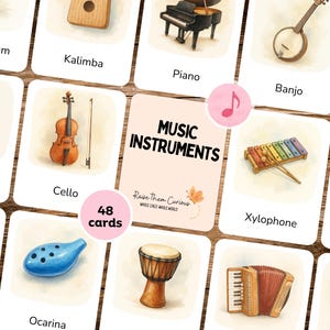Op de afbeelding: Geïllustreerde kaarten met verschillende muziekinstrumenten, waaronder een piano, cello en xylofoon. De centrale kaart toont "MUSIC INSTRUMENTS" en "48 kaarten". De kaarten zijn gerangschikt op een houten oppervlak.