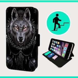 May include: Black phone case featuring a detailed wolf portrait with yellow eyes. The case is designed as a wallet, with slots for cards and a stand function. The image also shows a smartphone with a screen displaying app icons.