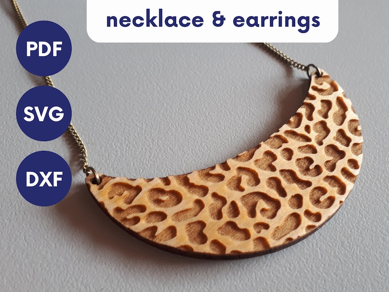 May include: A wooden necklace and earrings with a leopard print design. The necklace is a crescent shape and is on a gold chain. The earrings are not visible in the image. The image also includes text that says "PDF, SVG, DXF" in blue circles.