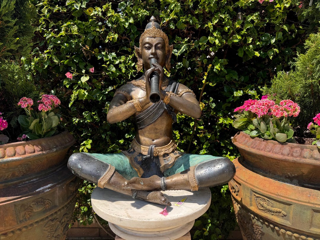 ブロンズ彫刻 フルートを持つ人物 佐藤助雄 ブロンズ像「フルートの調べ」のお買取りいたします