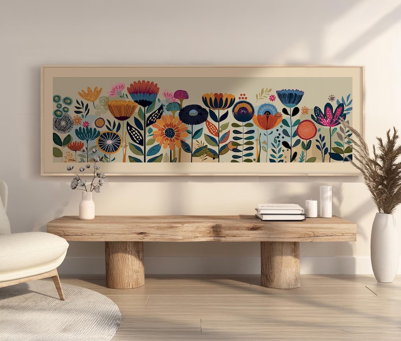 May include: A framed floral art print featuring a colorful array of stylized flowers in shades of blue, orange, and pink. The artwork is displayed above a wooden bench, creating a vibrant and decorative focal point for the room.