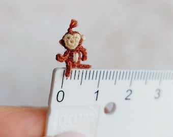 Figura de mono en miniatura de ganchillo, micro ganchillo