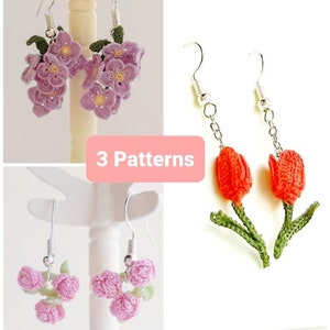 May include: Three pairs of crocheted flower earrings. The first pair is purple with a cluster of small flowers. The second pair is orange with two tulips. The third pair is pink with a cluster of small roses. The text "3 Patterns" is printed on a pink background.