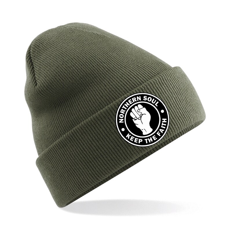 May include: A green beanie with a white circle logo that says "Northern Soul Keep The Faith" with a raised fist in the center.