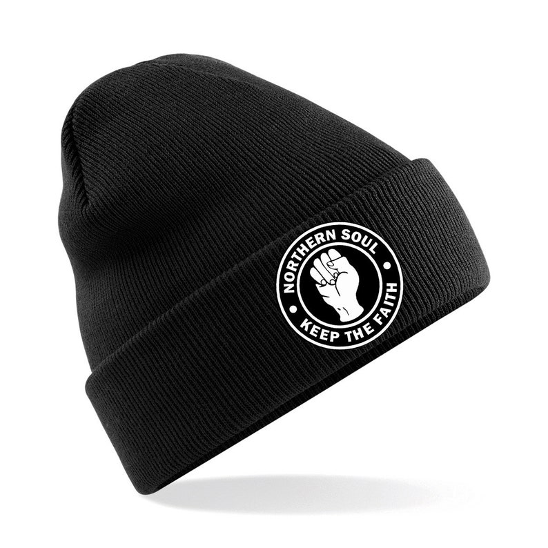 May include: Black beanie with a white circle logo that says "Northern Soul Keep The Faith" with a raised fist in the center.