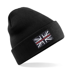 May include: Black beanie with an embroidered Union Jack flag patch featuring a red stripe.