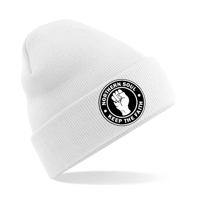 May include: White beanie with a black and white circular patch that says "Northern Soul Keep The Faith" with a raised fist in the center.