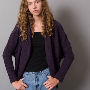 Mottled purple knitted cocoon cardiganthat can be worn as a jumper too. It comes with a coordinating infinity scarf.
